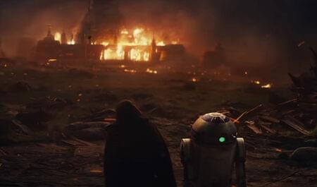 Luke and R2-D2 watch the Jedi temple burn